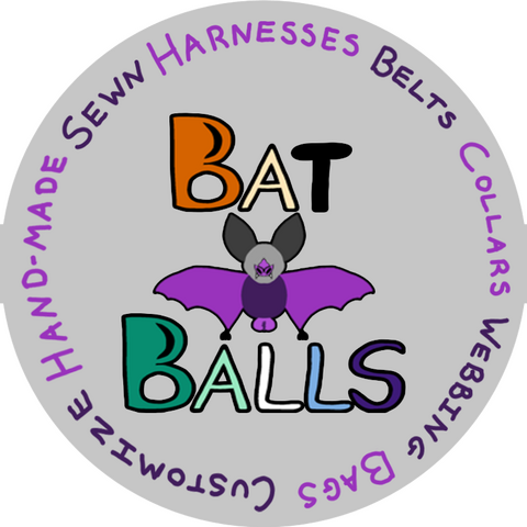 Bat Balls Logo A grey circle logo that says "Bat Balls" in various pride colors, with a simple purple and grey bat drawing between the words. On the circle are the words: harnesses, belts, collars, webbing, bags, customize, hand-made, and sewn.
